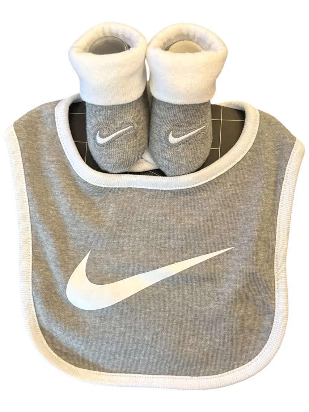 Nike Gray and White Baby Bib with Matching Booties